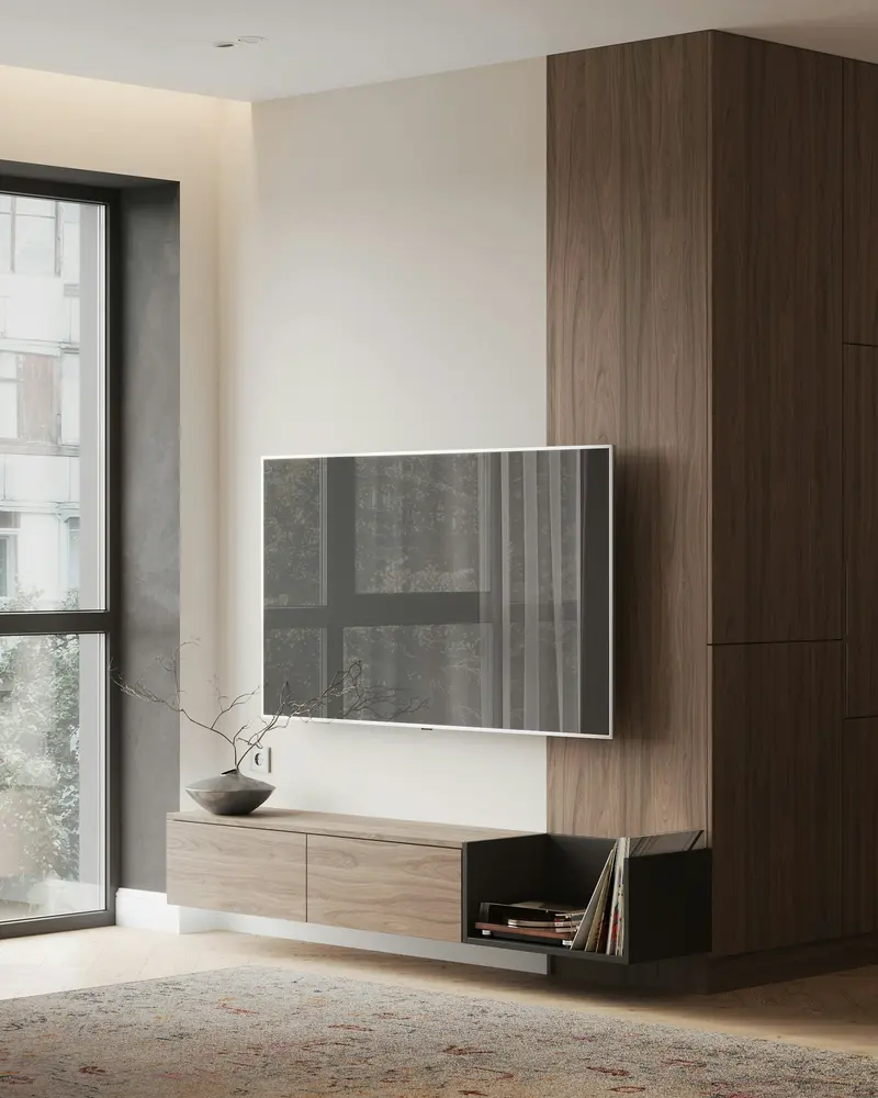 Sala com rack suspenso em madeira, painel lateral e TV na parede